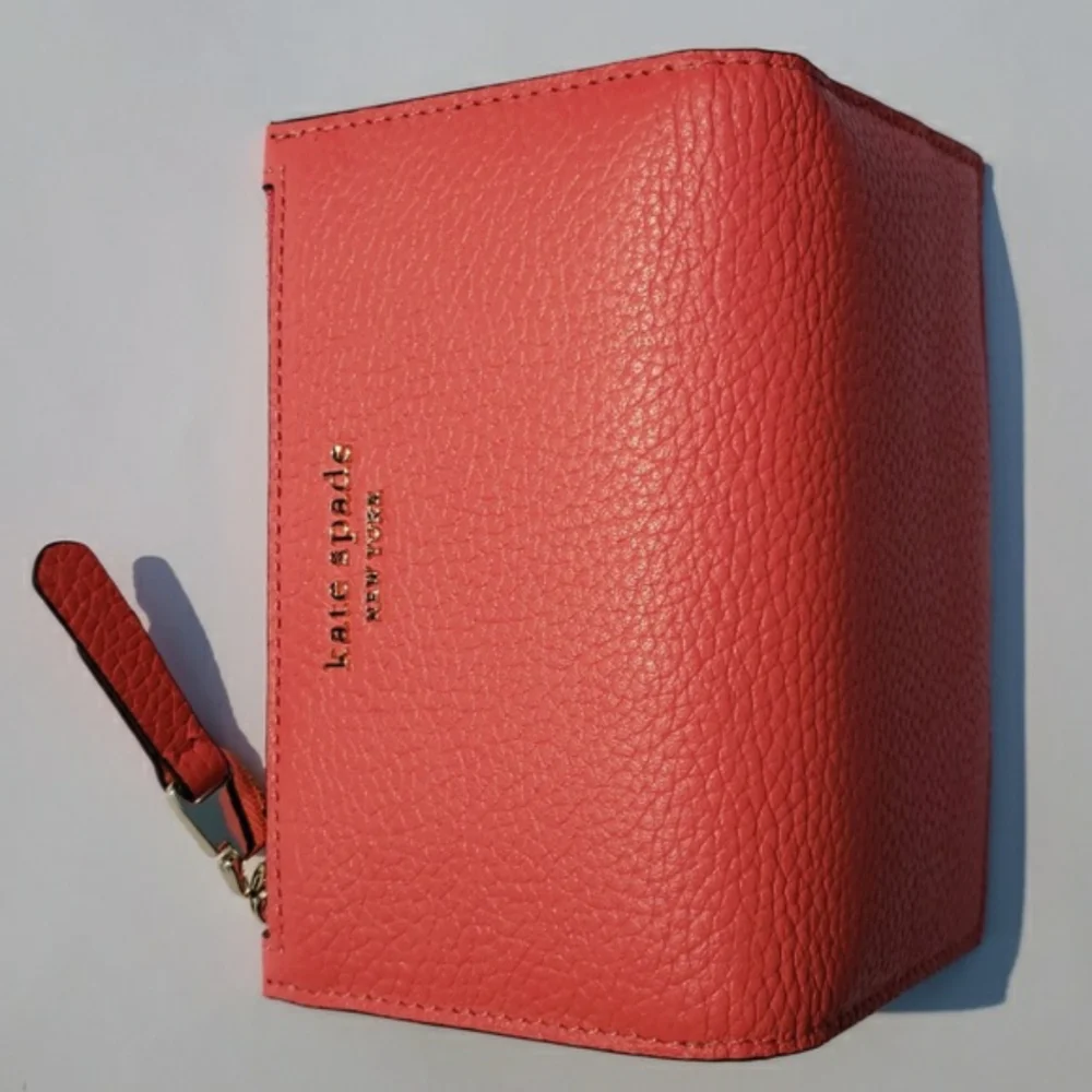 Kate Spade Leather Roulette Small Slim Bifold Wallet. Color: Peachmelba.